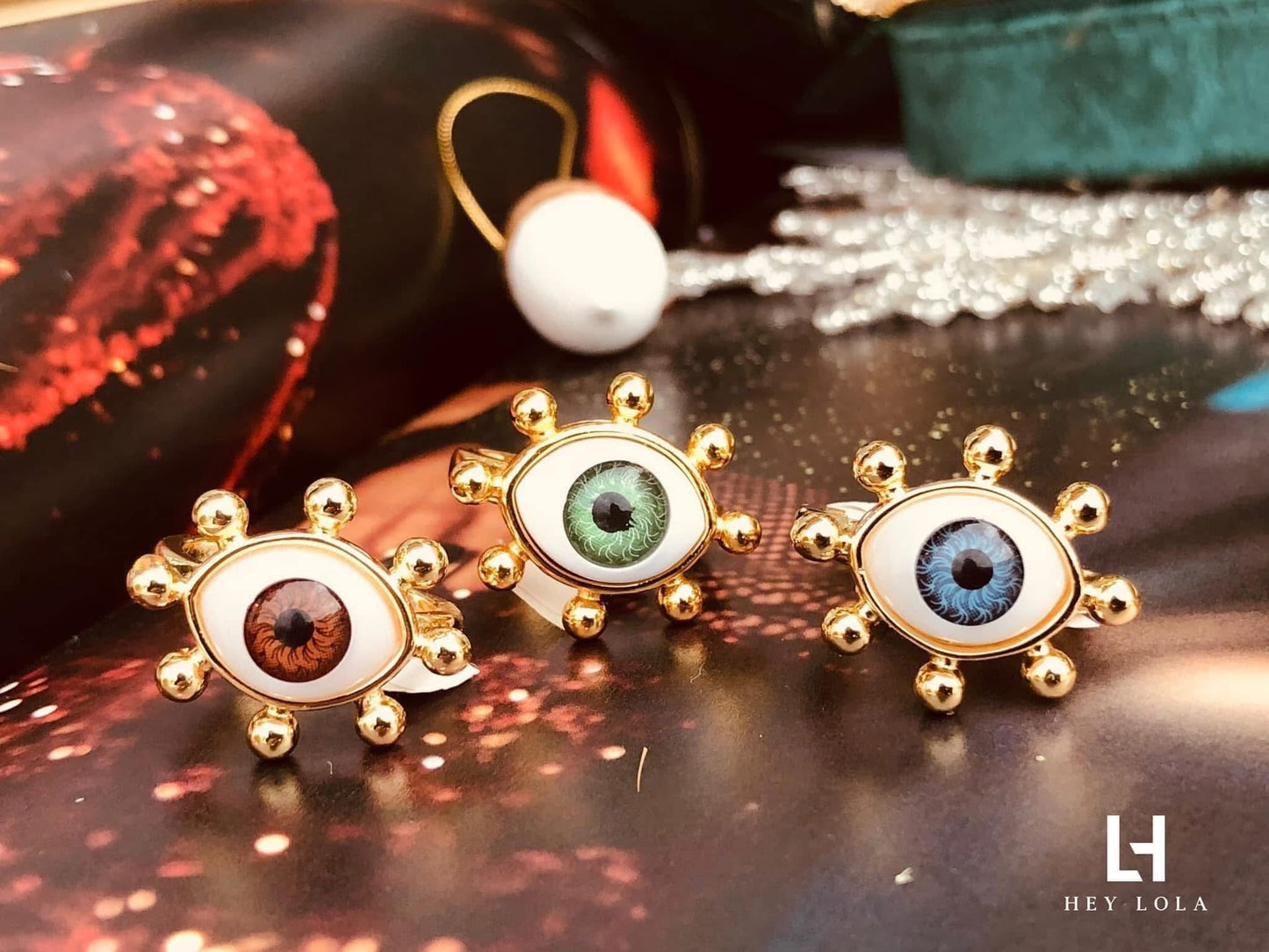 Broches de ojo protector chapados en oro de 18K