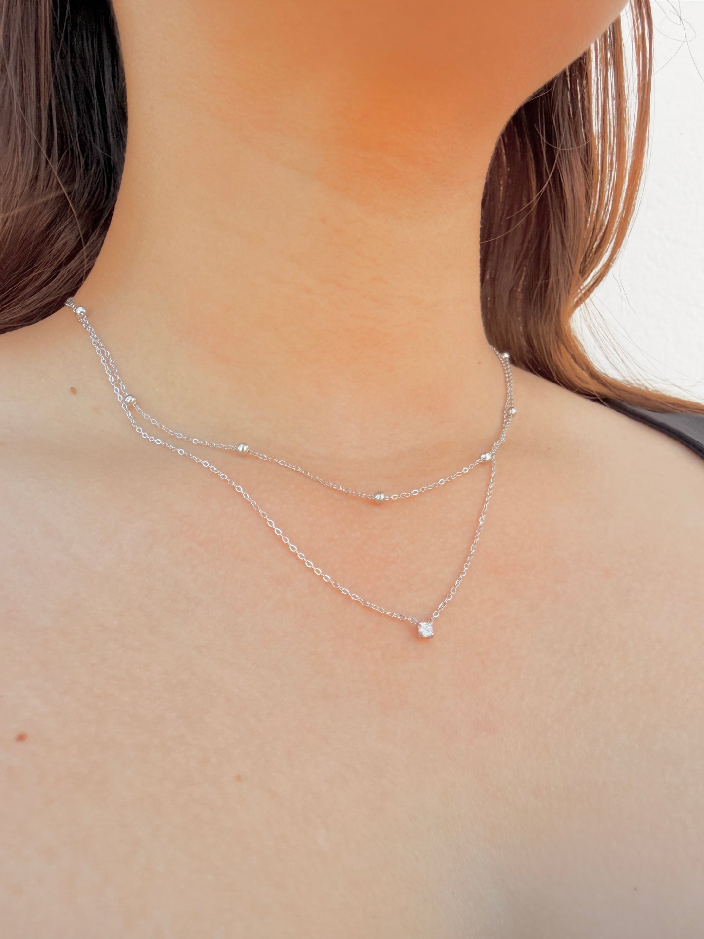 Collar Doble Punto de Luz
