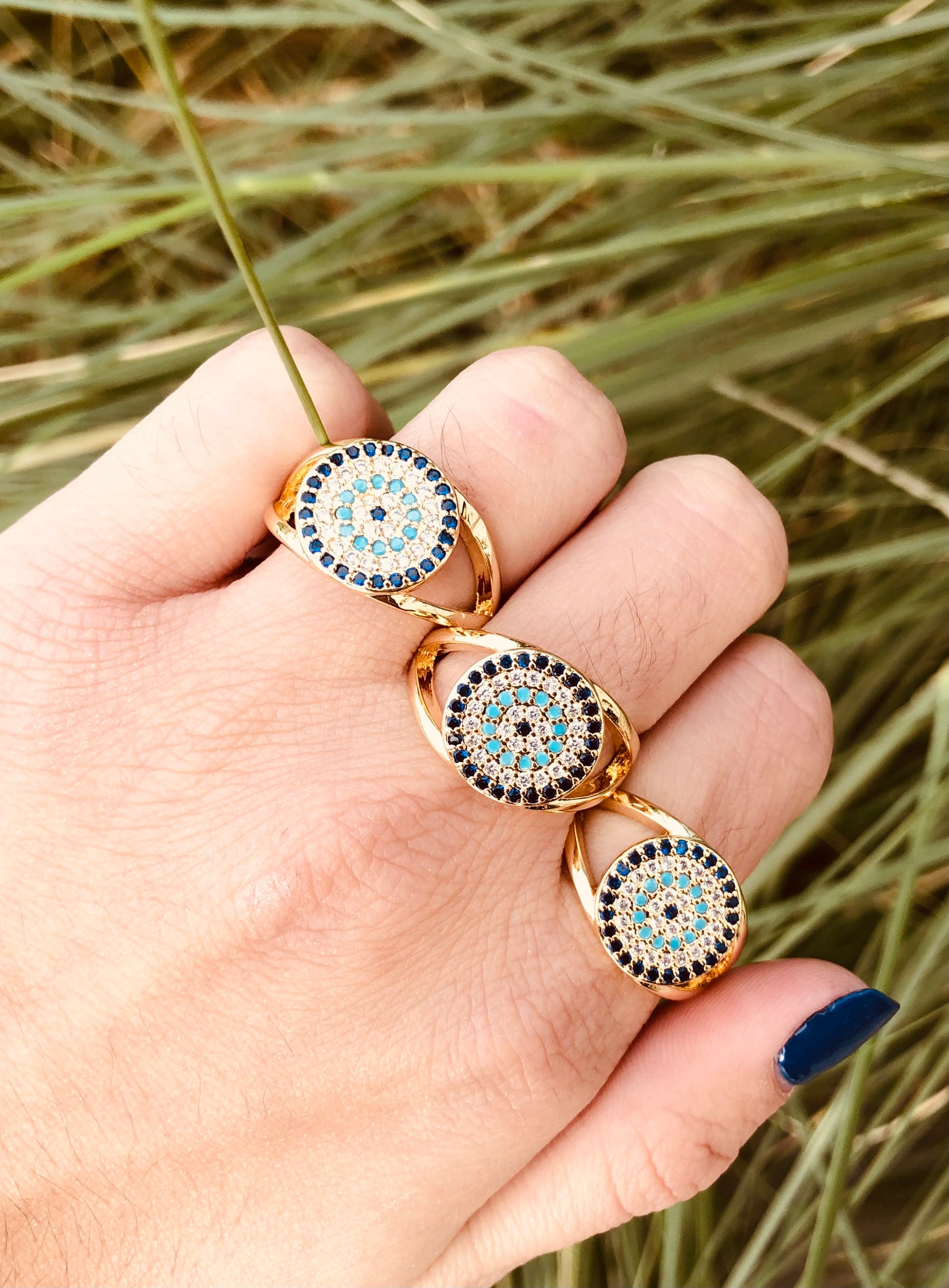 Anillos Ajustables con Diseño de Ojo Turco y Detalles en Zirconias