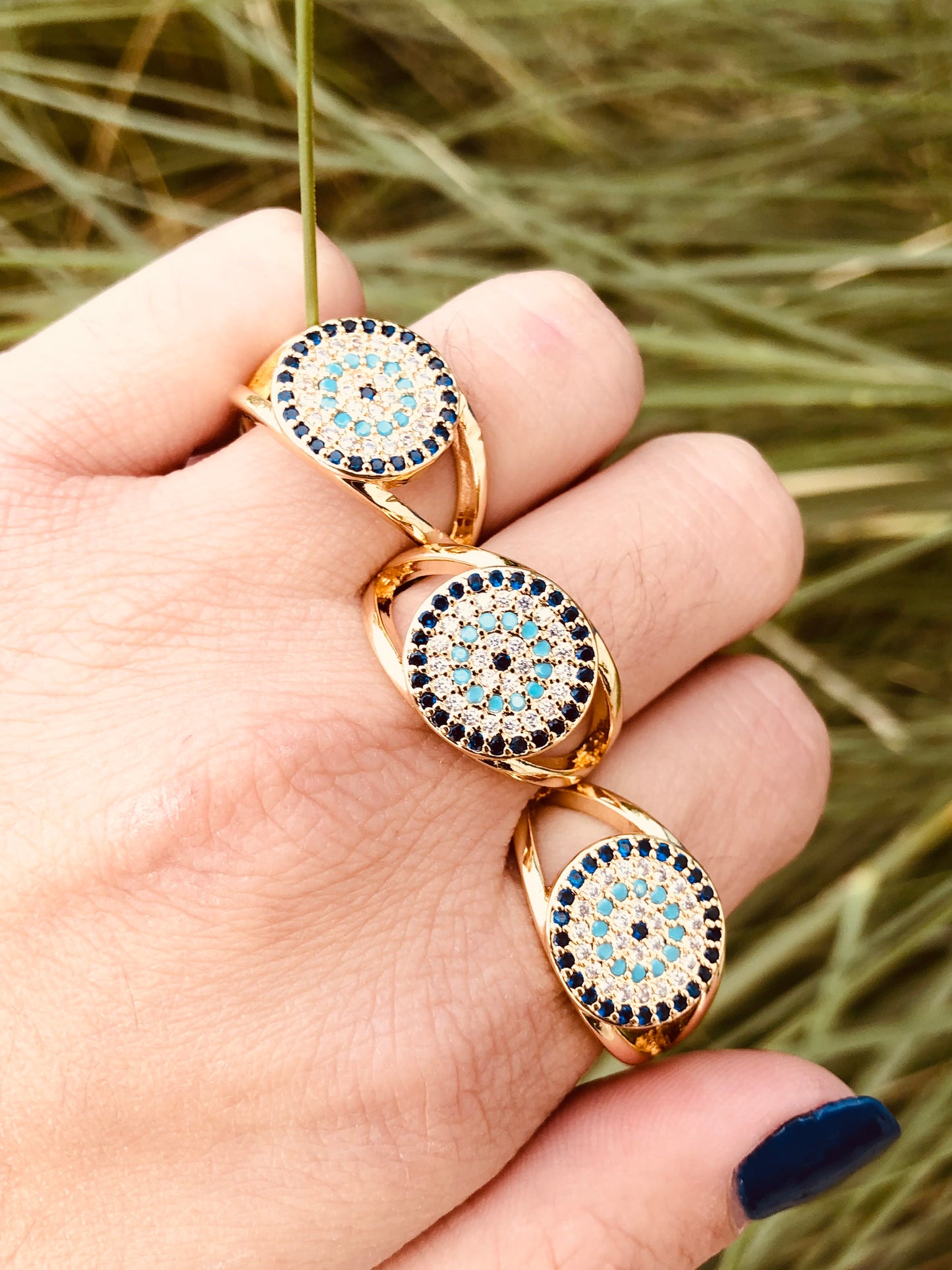 Anillos Ajustables con Diseño de Ojo Turco y Detalles en Zirconias