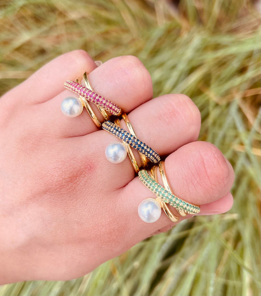 Anillos cruzados con perla y circonias de colores