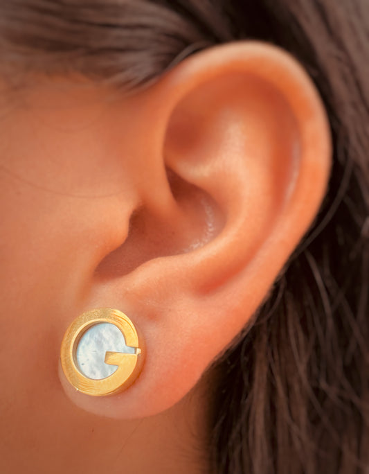 Aretes marca “G”