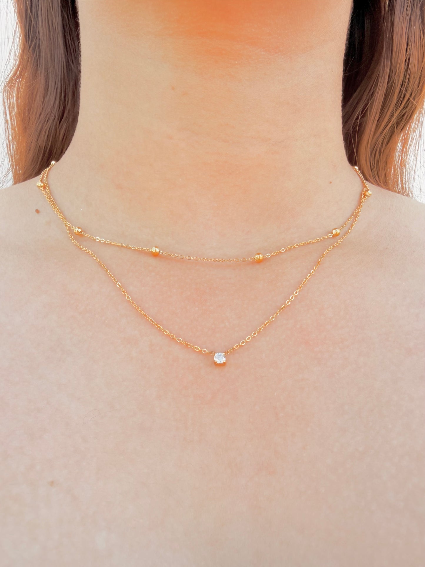 Collar Doble Punto de Luz